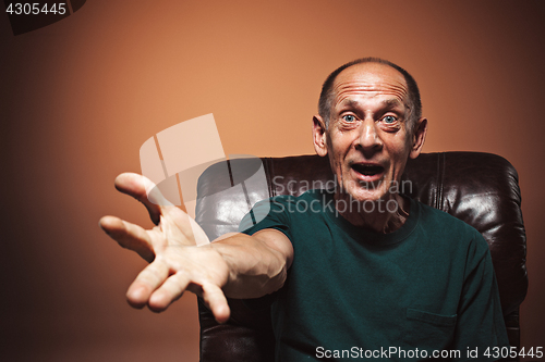 Image of Portrait of surprised mature man