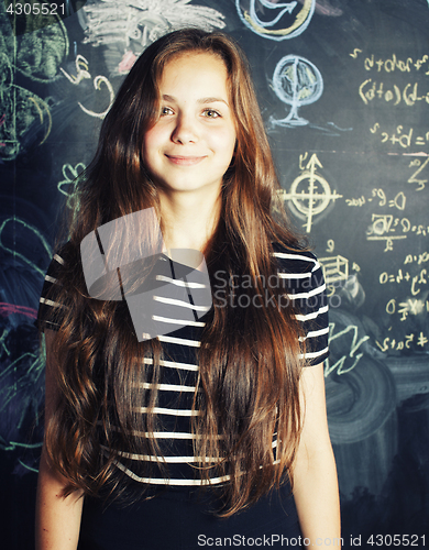 Image of back to school after summer vacations, cute teen real girl in classroom