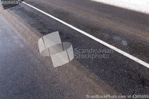 Image of muddy road, winter