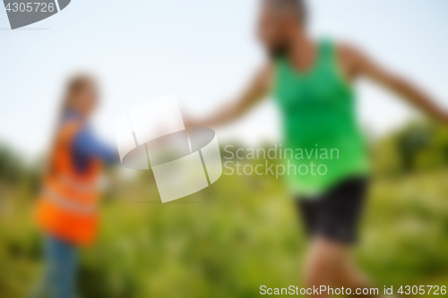 Image of blurred Photo of athlete in T-shirt