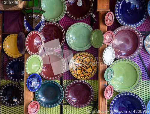 Image of Traditional arabic handcrafted, colorful decorated plates.