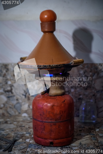 Image of Traditional moroccan tagine making on gas bottle