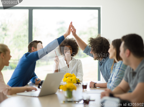 Image of Multiethnic startup Business Team At A Meeting at modern office 
