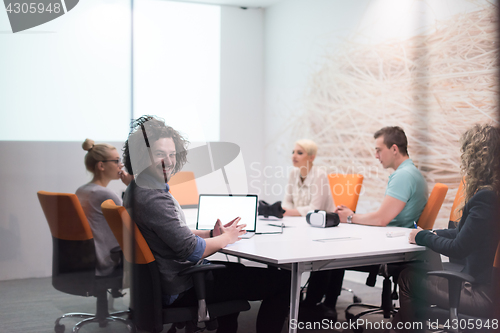 Image of Startup Business Team At A Meeting at modern night office buildi