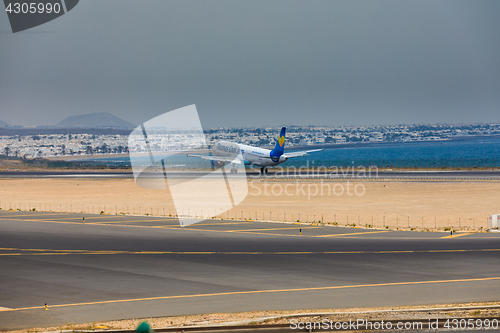 Image of ARECIFE, SPAIN - APRIL, 16 2017: AirBus A321 of ThomasCook.com w