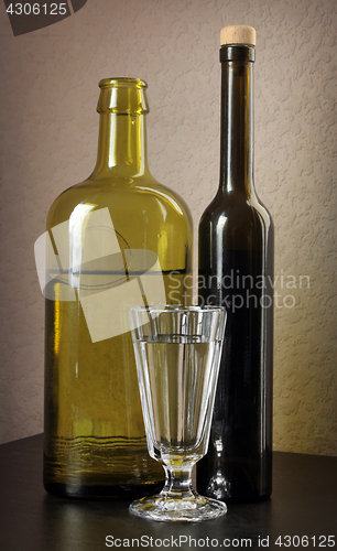 Image of  Shot Glass and Two Bottles