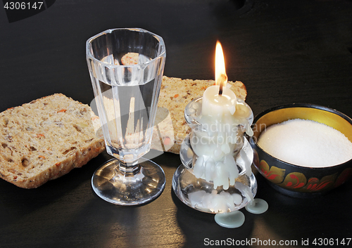 Image of Candlestick, Vodka and Bread