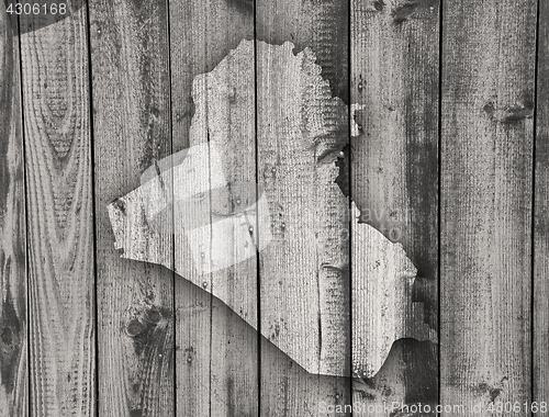 Image of Map of Iraq on weathered wood