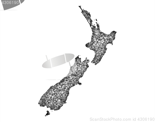Image of Map of New Zealand on poppy seeds,