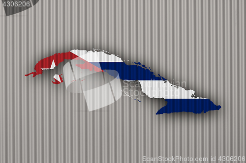 Image of Map and flag of Cuba on corrugated iron