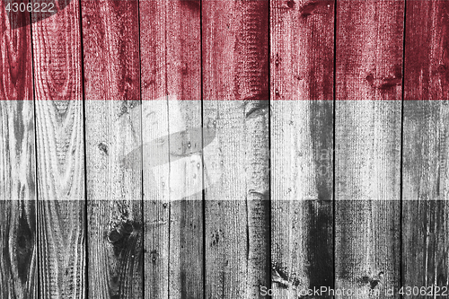 Image of Flag of Yemen on weathered wood