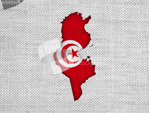 Image of Map and flag of Tunisia on old linen