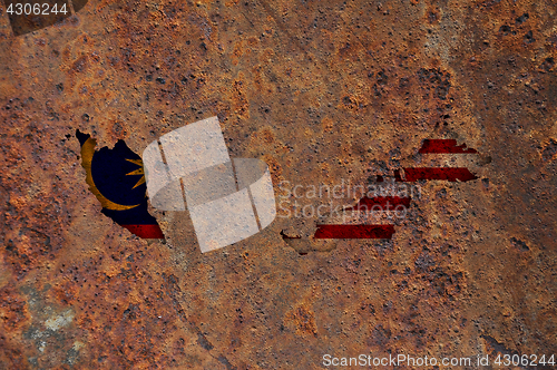 Image of Map and flag of Malaysia on rusty metal