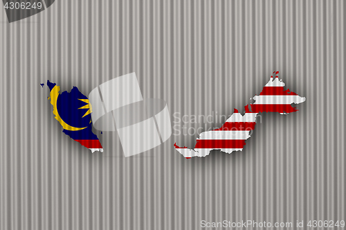 Image of Map and flag of Malaysia on corrugated iron