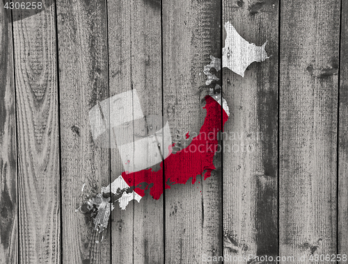 Image of Map and flag of Japan on weathered wood