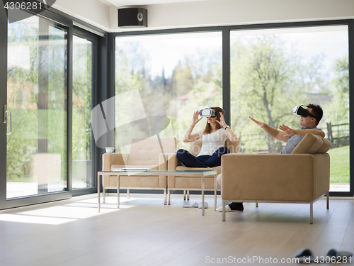 Image of Couple using virtual reality headset