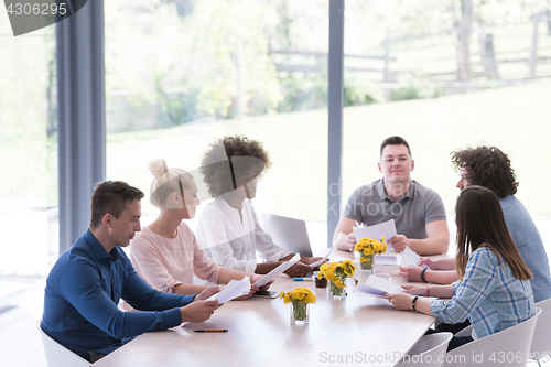 Image of Multiethnic startup business team on meeting