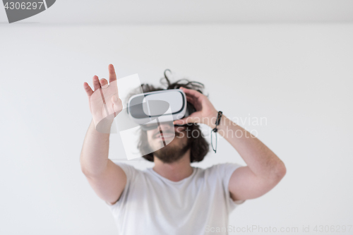 Image of Man using headset of virtual reality