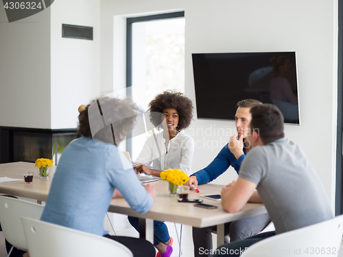 Image of Multiethnic startup Business Team At A Meeting at modern office 