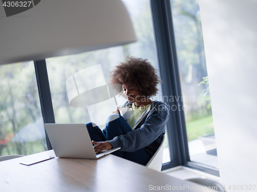 Image of African American woman in the living room