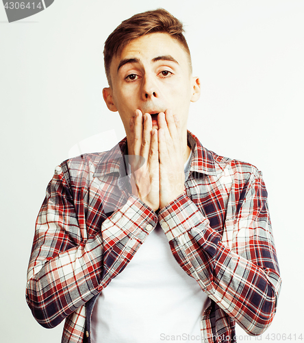 Image of young handsome teenage hipster guy posing emotional, happy smiling against white background isolated, lifestyle people concept 