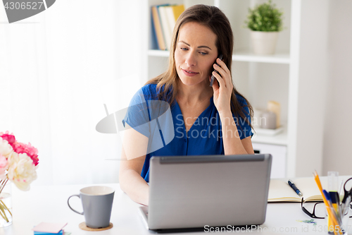 Image of woman calling on smartphone at office or home