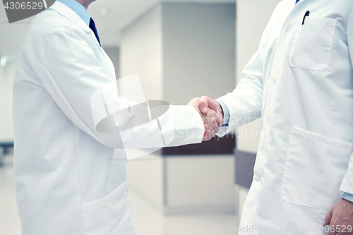 Image of close up of doctors making handshake