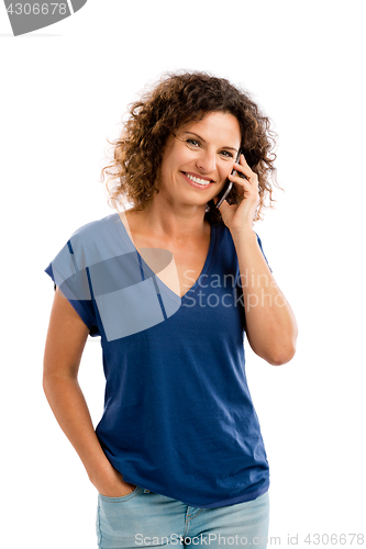 Image of Happy woman talking at phone