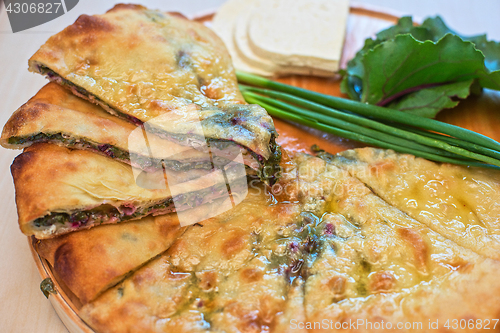 Image of ossetian pie on a white