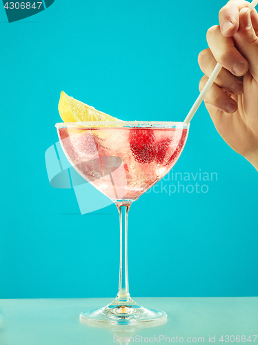 Image of Fresh raspberry coctail on the restaurant table