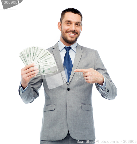 Image of smiling businessman with american dollar money