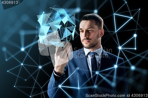 Image of businessman with transparent smartphone