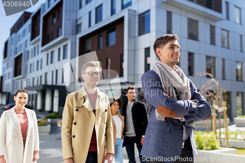 Image of international group of people on city street
