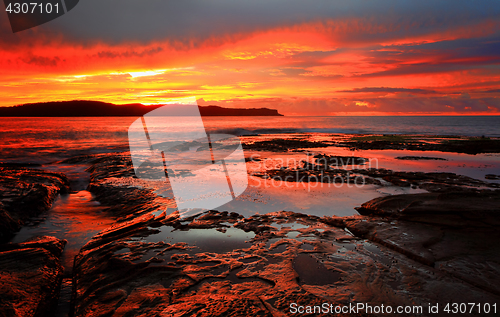 Image of Red sunrise blankets Pearl Beach Australia