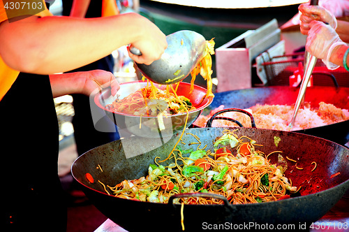 Image of Stir fry cooking.