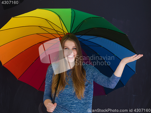 Image of handsome woman with a colorful umbrella