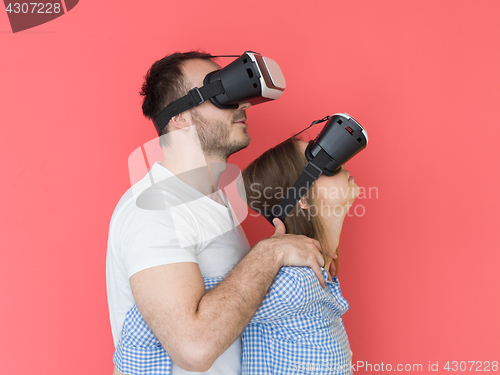 Image of happy couple using VR-headset glasses of virtual reality