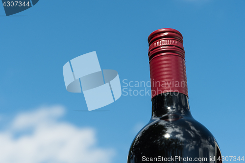 Image of Top of a red wine bottle