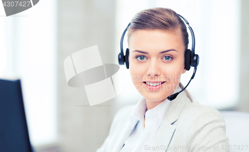 Image of female helpline operator with headphones