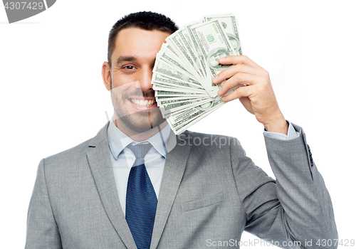 Image of smiling businessman with american dollar money