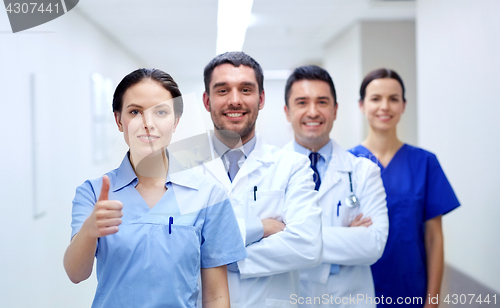 Image of medics or doctors at hospital showing thumbs up