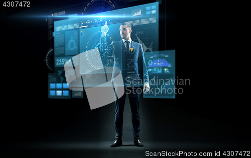Image of businessman in suit touching
