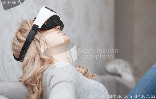 Image of Woman wearing Virtual reality headset