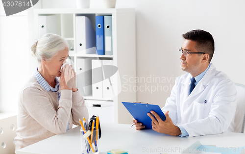 Image of senior woman and doctor meeting at hospital