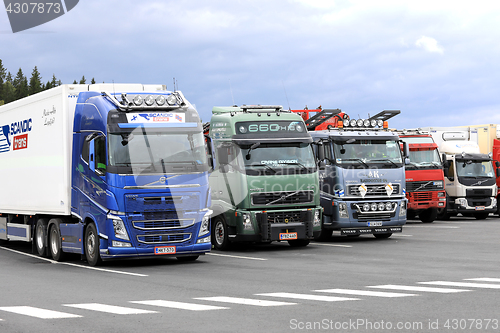 Image of Colorful Volvo Trucks on Truck Stop