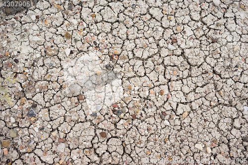 Image of Sun Baked Ground Gravel Rocks Badlands National Park Rock