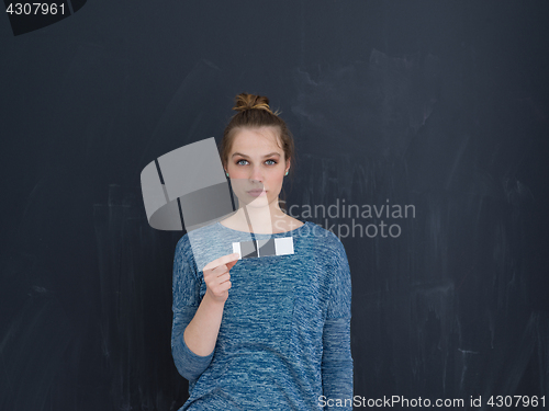 Image of young woman isolated on grey background