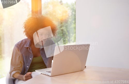 Image of African American woman in the living room