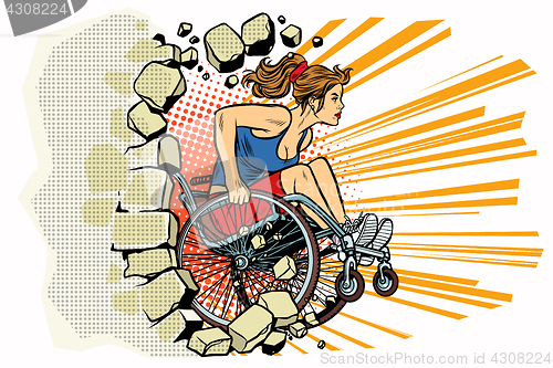 Image of Caucasian woman athlete in a wheelchair punches the wall