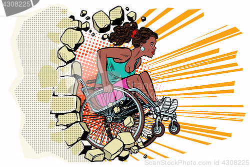 Image of Black woman athlete in a wheelchair punches the wall